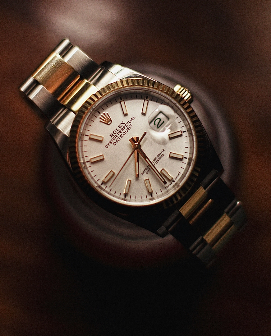 Close up of luxury watch on dark background