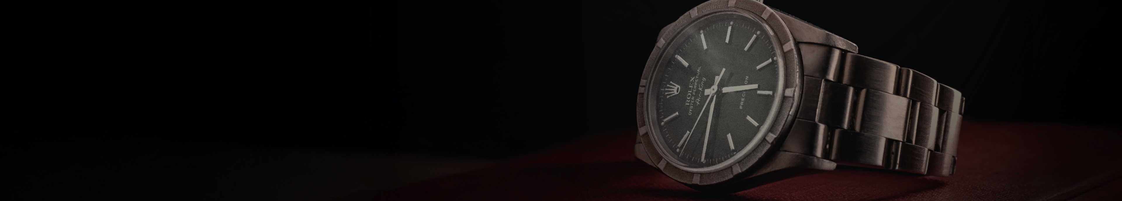 Dark textured background with watch details